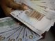 EIU Forecasts Double-Digit Naira Depreciation in 2024 Amidst Inflation Challenges
